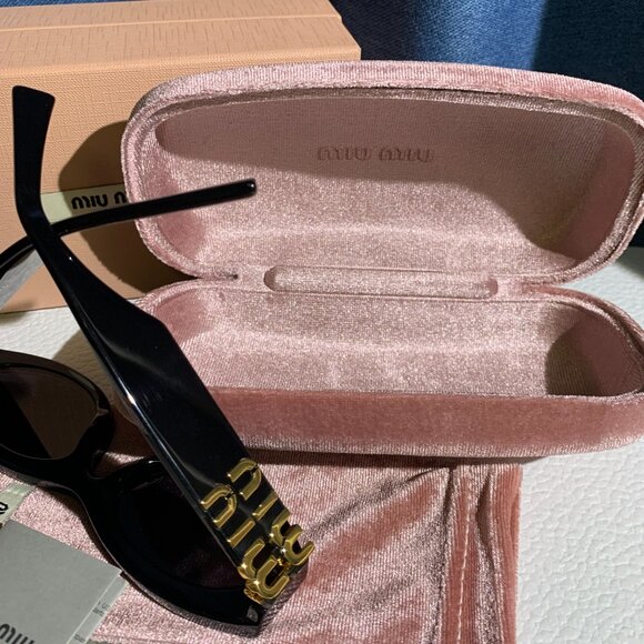 Miu Miu Black Oval Sunglasses • Gold Logo Statement main image 8